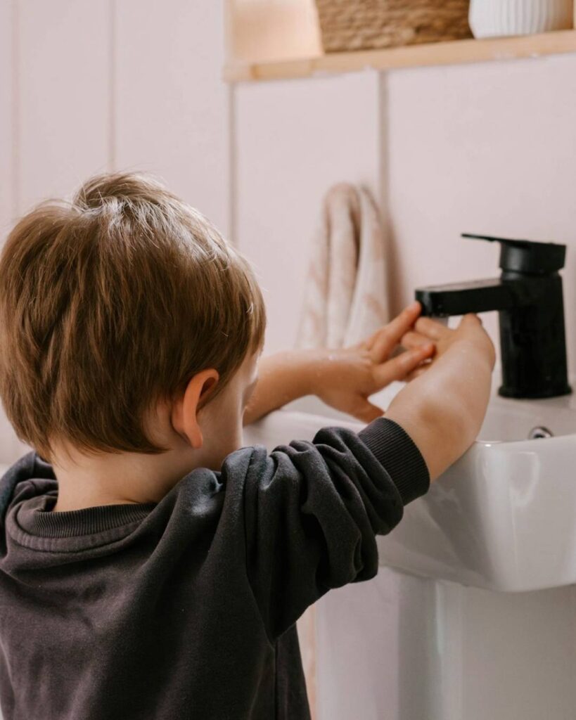 Toddler learning healthy routines at Adventure Learning Center